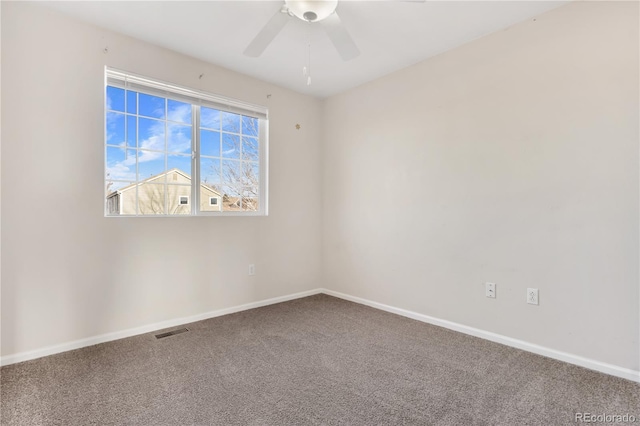 carpeted empty room with ceiling fan