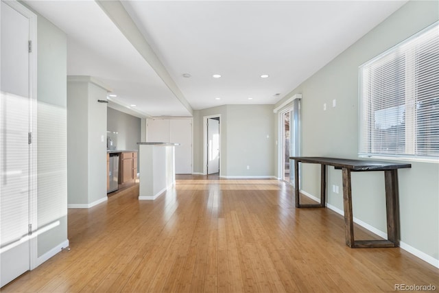 unfurnished living room with light hardwood / wood-style floors