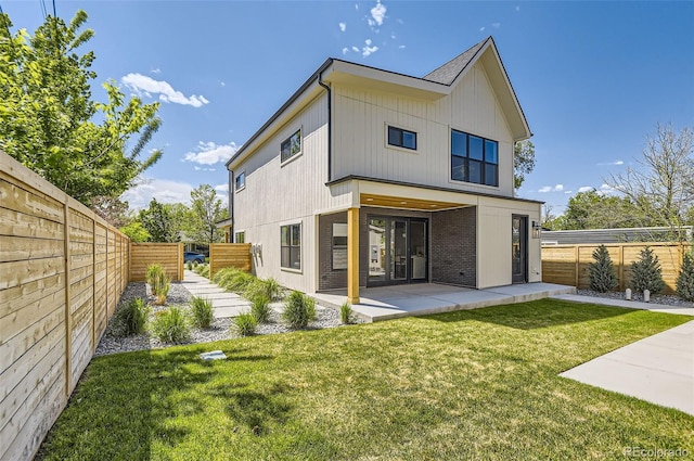 back of house featuring a patio area