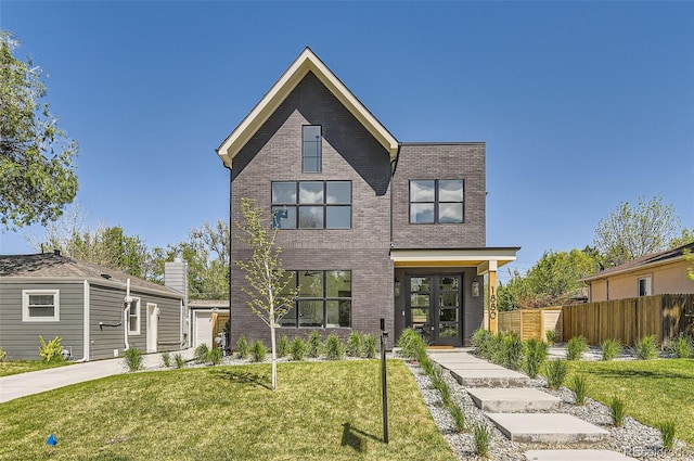 contemporary house with brick siding and french doors
