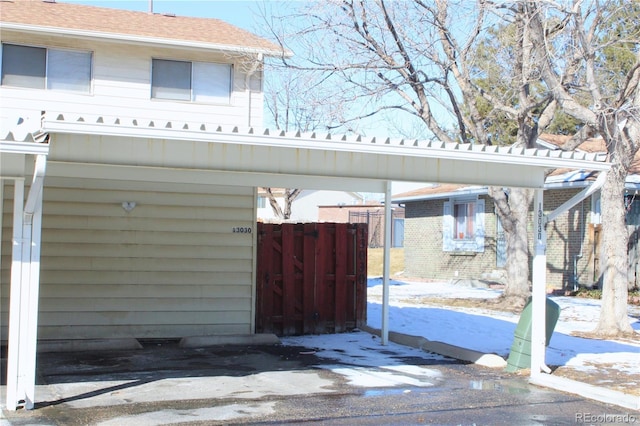 exterior space featuring a carport