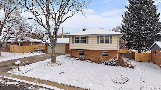 split level home with a garage