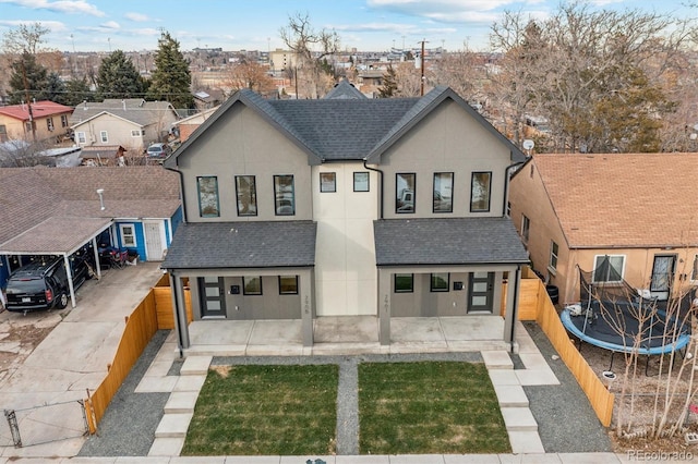 view of front of house with a trampoline