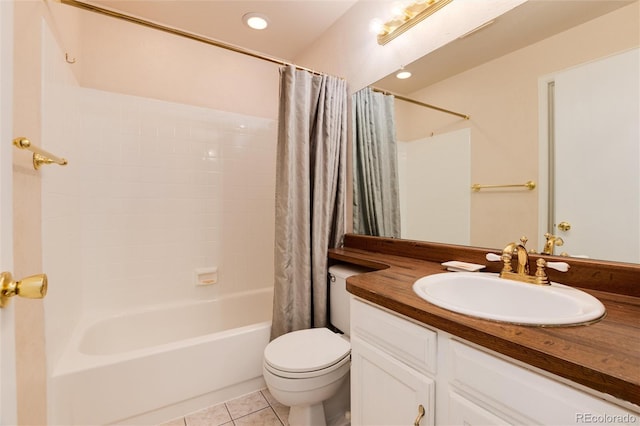 full bathroom featuring vanity, shower / bathtub combination with curtain, tile patterned floors, and toilet