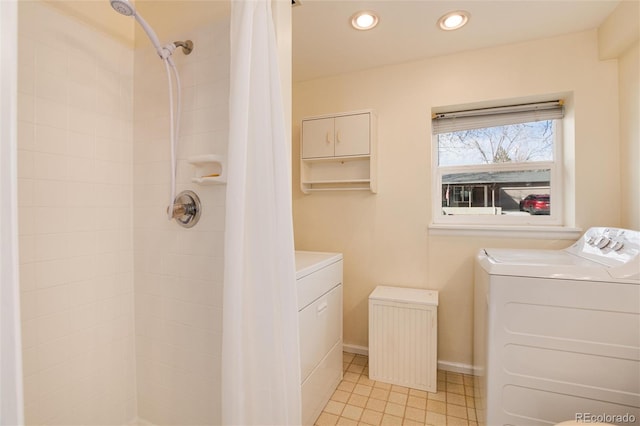 clothes washing area featuring independent washer and dryer