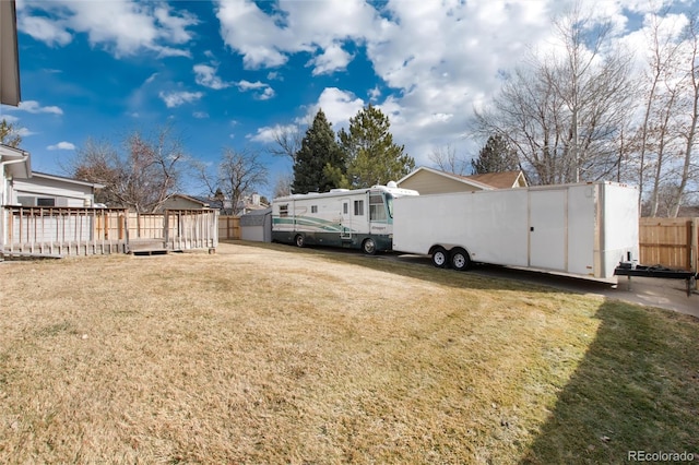 view of yard with a deck