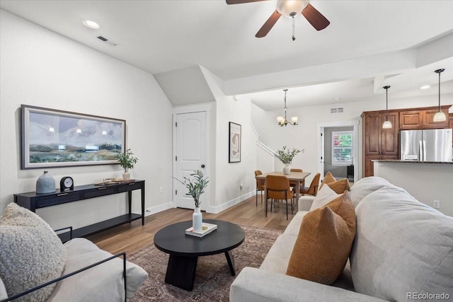 5850 Dripping Rock Ln Unit G102, Fort Collins, CO 80528 - living room with wood finished floors, a chandelier, ceiling fan, baseboards, and recessed lighting