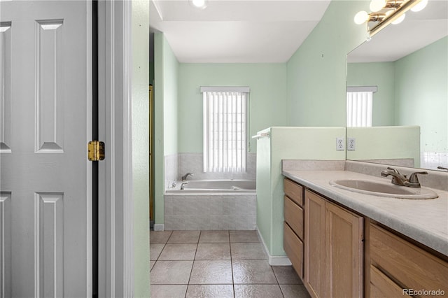 465 W Palmer Lake Dr, Pueblo, CO 81007 - bathroom featuring vanity, a garden tub, and tile patterned floors