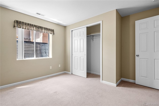 465 W Palmer Lake Dr, Pueblo, CO 81007 - unfurnished bedroom featuring carpet floors, baseboards, and a closet