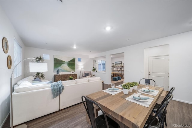 3899 N Shaenee St, Aurora, CO 80019 - dining space with wood finished floors, baseboards, and recessed lighting