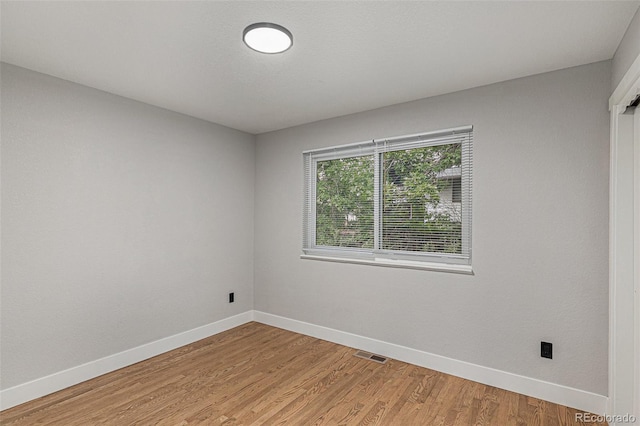 10051 E Walsh Pl, Denver, CO 80247 - spare room with baseboards and light wood-type flooring
