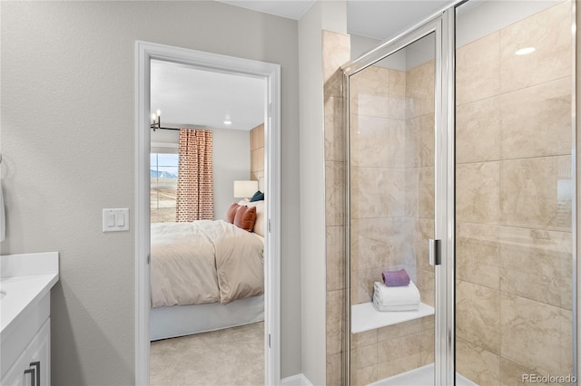 ensuite bathroom with vanity, a stall shower, and ensuite bath