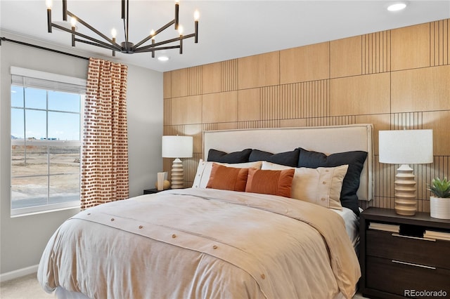 bedroom featuring baseboards, recessed lighting, and a chandelier