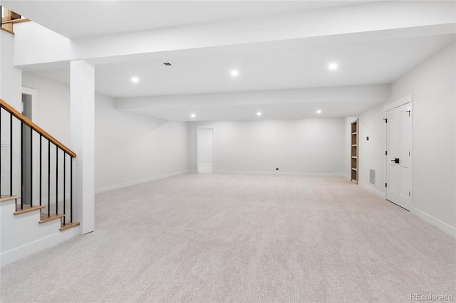 basement with light colored carpet