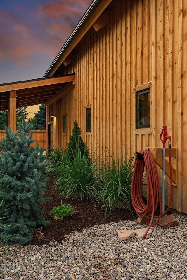 view of property exterior at dusk