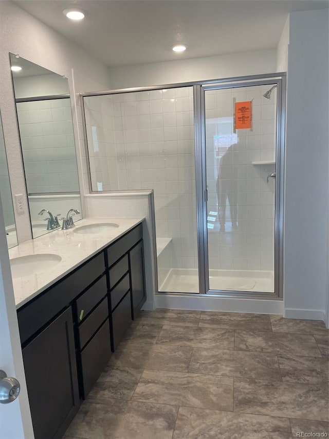 6750 Juniper Dr, Thornton, CO 80602 - full bath featuring a shower stall and double vanity