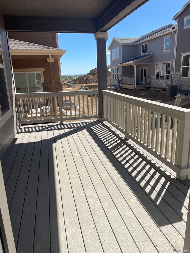 6750 Juniper Dr, Thornton, CO 80602 - wooden terrace featuring central AC and a mountain view