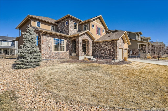 view of front facade featuring an attached garage, stone siding, concrete driveway, stucco siding, and a front lawn