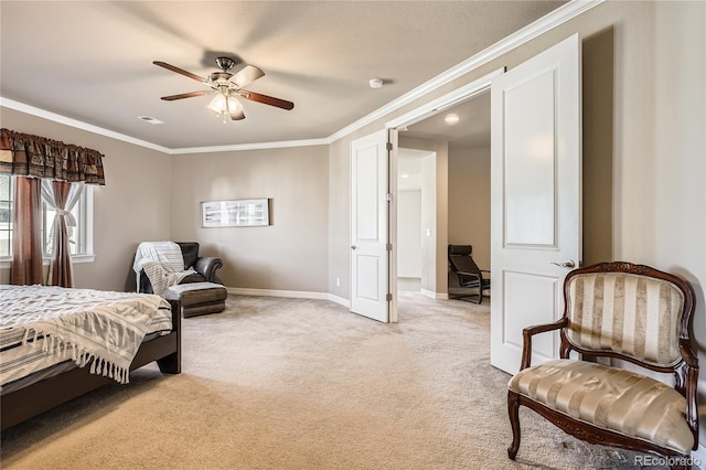 bedroom with ceiling fan, light colored carpet, visible vents, baseboards, and crown molding