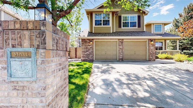view of front of home featuring brick siding, concrete driveway, fence, an attached garage, and roof with shingles