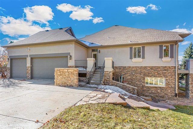 view of front of property with a garage