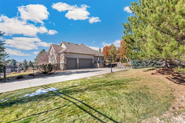 view of home's exterior with a garage and a yard