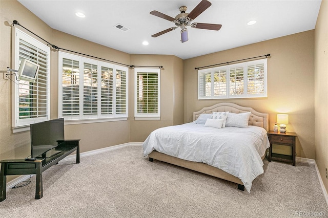 carpeted bedroom with ceiling fan