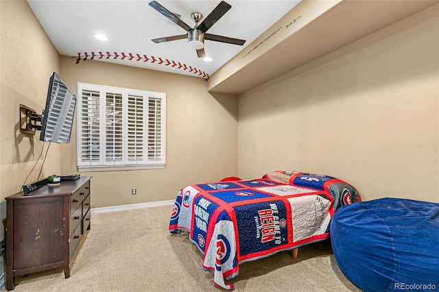 bedroom featuring ceiling fan and light colored carpet