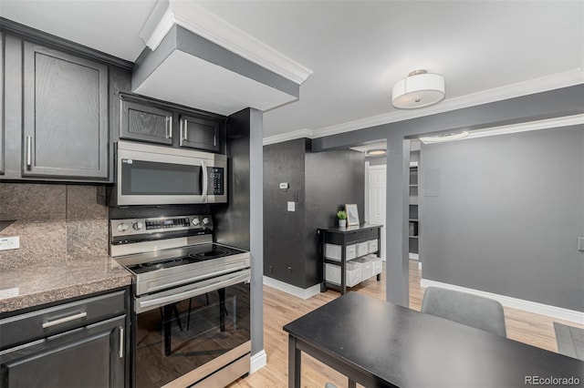 1390 N Emerson St Unit 101, Denver, CO 80218 - kitchen with stainless steel appliances, light wood finished floors, crown molding, tile countertops, and backsplash
