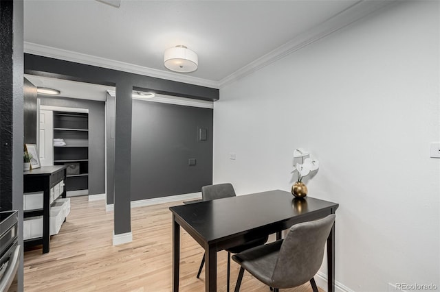 1390 N Emerson St Unit 101, Denver, CO 80218 - dining room with crown molding and light wood-type flooring