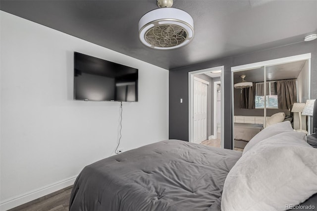1390 N Emerson St Unit 101, Denver, CO 80218 - bedroom featuring wood finished floors and baseboards