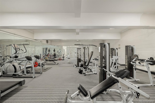 1390 N Emerson St Unit 101, Denver, CO 80218 - workout area with beamed ceiling and an AC wall unit