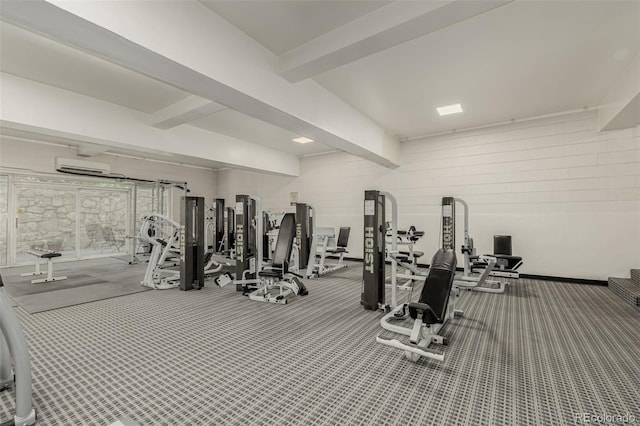 1390 N Emerson St Unit 101, Denver, CO 80218 - workout area featuring beam ceiling, carpet flooring, and a wall mounted air conditioner