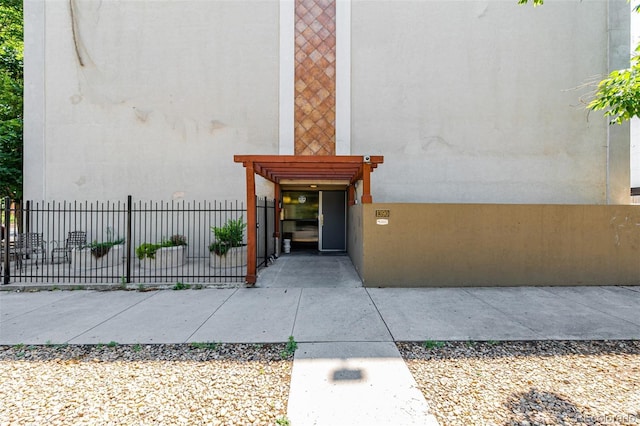 1390 N Emerson St Unit 101, Denver, CO 80218 - property entrance with stucco siding