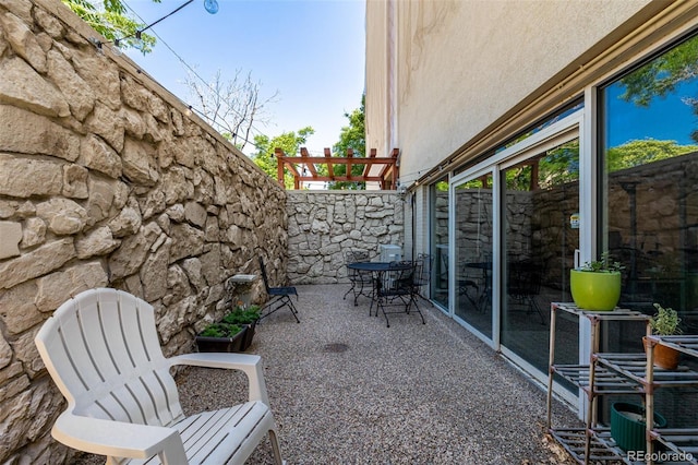 1390 N Emerson St Unit 101, Denver, CO 80218 - view of patio with outdoor dining space