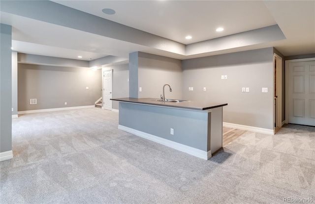 578 Sage Grouse Cir, Castle Rock, CO 80109 - kitchen with a sink, light colored carpet, baseboards, and recessed lighting