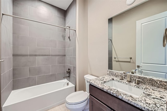 full bathroom with toilet, tiled shower / bath combo, and vanity