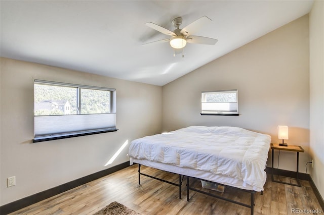 104 River Run Dr, Buena Vista, CO 81211 - bedroom featuring lofted ceiling, wood finished floors, and ceiling fan