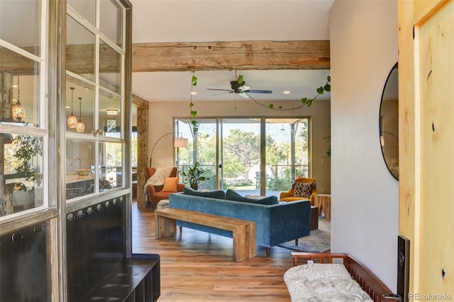 104 River Run Dr, Buena Vista, CO 81211 - living area with wood finished floors, ceiling fan, and beamed ceiling