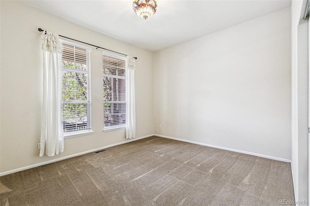 6085 Nile Cir, Golden, CO 80403 - empty room with carpet floors and plenty of natural light