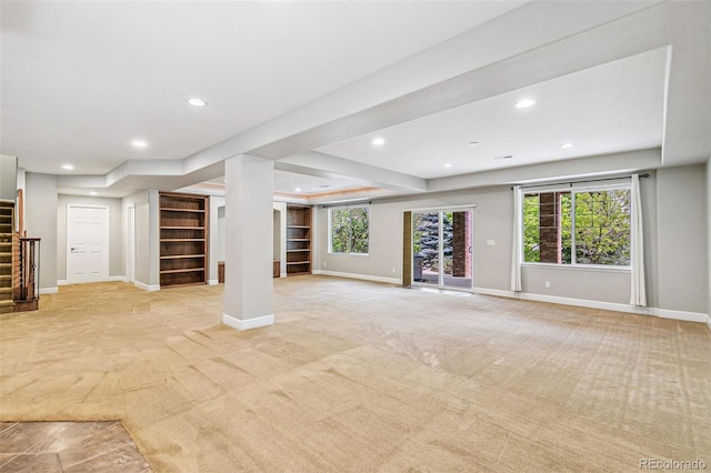6085 Nile Cir, Golden, CO 80403 - unfurnished living room with stairs, light colored carpet, and recessed lighting