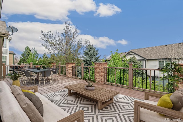 6085 Nile Cir, Golden, CO 80403 - wooden terrace with outdoor dining space and an outdoor hangout area