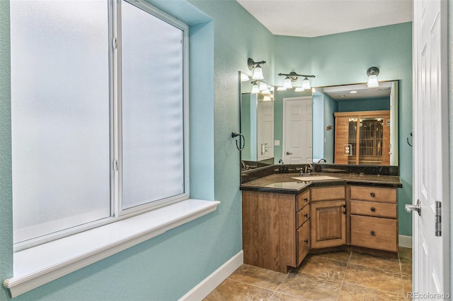 6085 Nile Cir, Golden, CO 80403 - bathroom featuring vanity and baseboards
