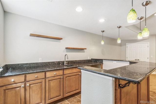 6085 Nile Cir, Golden, CO 80403 - kitchen with open shelves, brown cabinetry, a kitchen island, recessed lighting, and hanging light fixtures