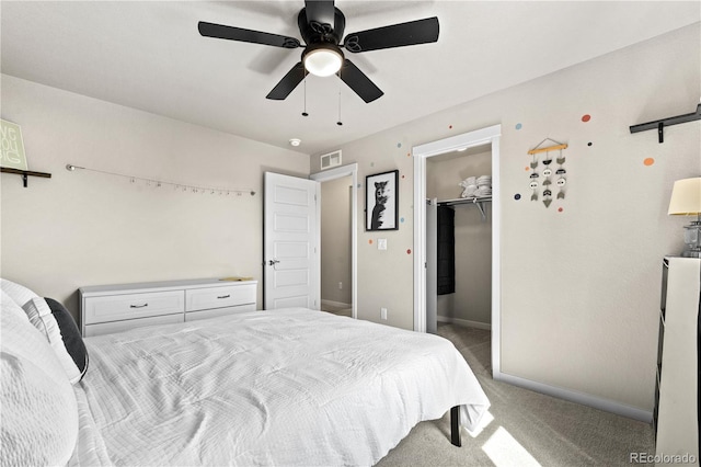 244 Chipeta Way, Lochbuie, CO 80603 - carpeted bedroom with a walk in closet, ceiling fan, and a closet