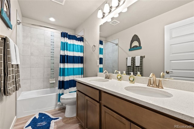 244 Chipeta Way, Lochbuie, CO 80603 - bathroom with wood finished floors, shower / tub combo, and double vanity