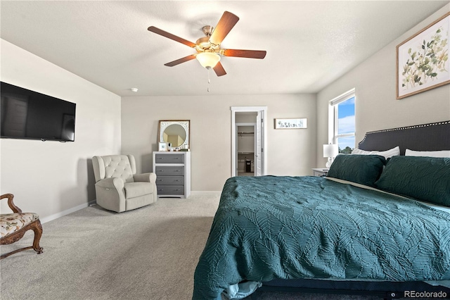 244 Chipeta Way, Lochbuie, CO 80603 - bedroom with carpet flooring, a ceiling fan, and a spacious closet