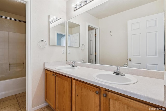 4848 Fenwood Dr, Highlands Ranch, CO 80130 - bathroom with double vanity, tile patterned flooring, and shower / bath combination