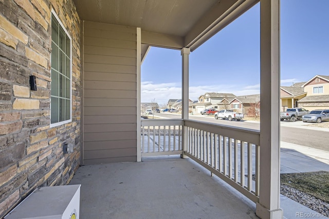 view of patio featuring a residential view and covered porch