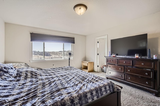 bedroom with light carpet